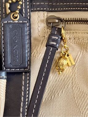 Mouse Bag Charm, featuring a textured metal finish and a signature brand tag.